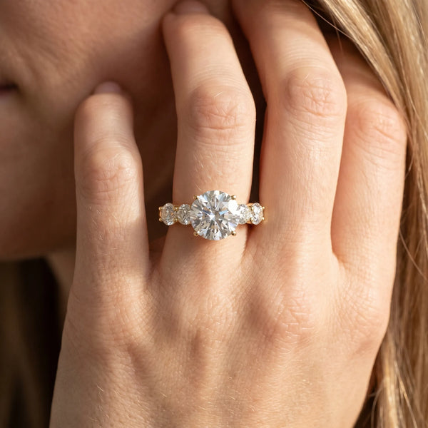 Yellow gold Round Cut Five-Stone Prong Set Diamond Ring with Classic Band