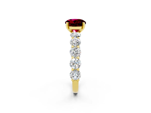 Yellow gold Round Cut Garnet Prong Setting with Side Stones on a Pave Band