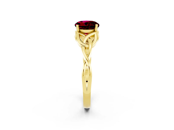 Yellow gold Round Cut Garnet Solitaire Engagement Ring with Celtic Knot Band and Four-Prong Setting