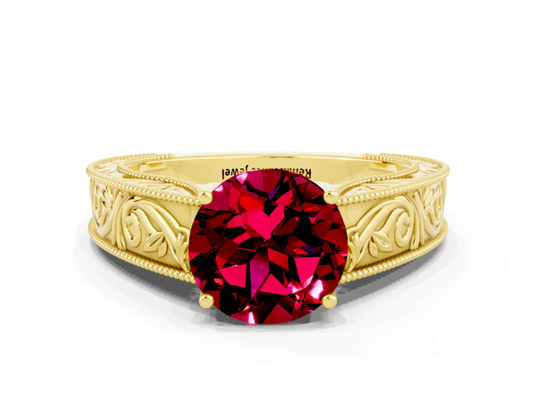 Yellow gold Round Cut Garnet Solitaire Ring with Engraved Band and Four-Prong Setting