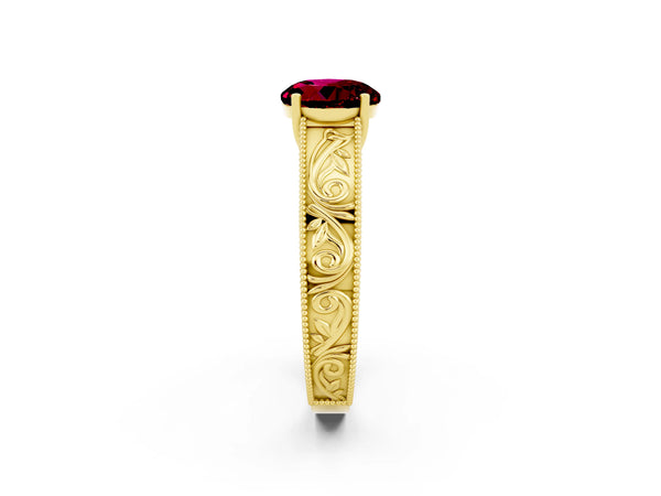 Yellow gold Round Cut Garnet Solitaire Ring with Engraved Band and Four-Prong Setting