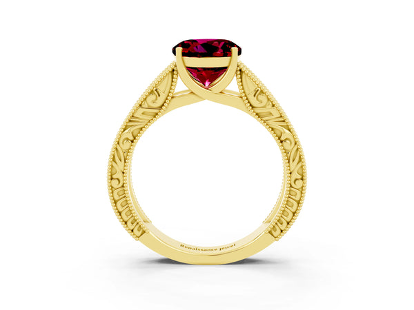 Yellow gold Round Cut Garnet Solitaire Ring with Engraved Band and Four-Prong Setting