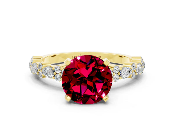 Yellow gold Round Cut Garnet Side Stone Solitaire Ring with Round  and Four-Prong Setting
