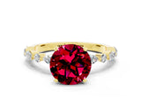 Yellow gold Round Cut Garnet Solitaire with Side Stones on a Pavé Band and Four-Prong Setting