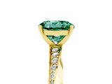 Yellow gold Round Cut Green Sapphire Engagement Ring with Side Stone Accents and Four-Prong Setting_65