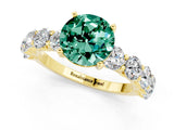Yellow gold Round Cut Green Sapphire Prong Setting with Side Stones on a Pave Band_1
