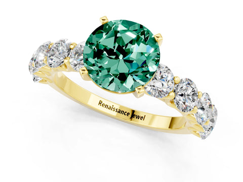 Yellow gold Round Cut Green Sapphire Prong Setting with Side Stones on a Pave Band_1