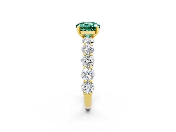 Yellow gold Round Cut Green Sapphire Prong Setting with Side Stones on a Pave Band