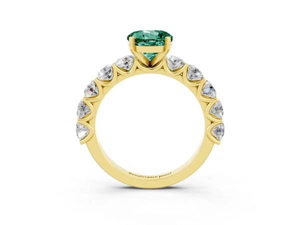 Yellow gold Round Cut Green Sapphire Prong Setting with Side Stones on a Pave Band
