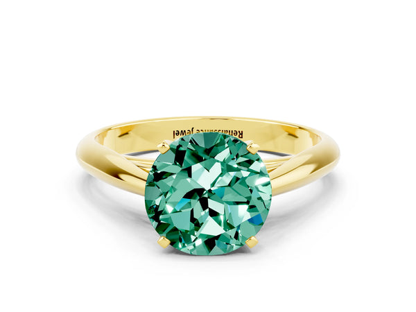 Yellow gold Round Cut Green Sapphire Solitaire Engagement Ring with Cathedral Setting and Four-Prong Mount
