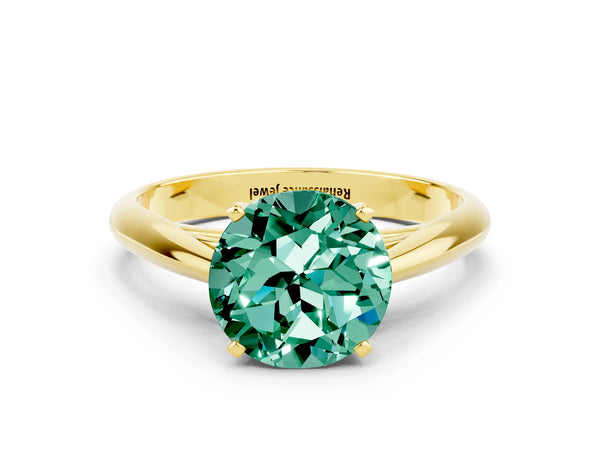 Yellow gold Round Cut Green Sapphire Solitaire Engagement Ring with Cathedral Setting and Four-Prong Mount
