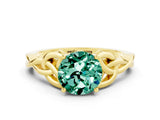 Yellow gold Round Cut Green Sapphire Solitaire Engagement Ring with Celtic Knot Band and Four-Prong Setting