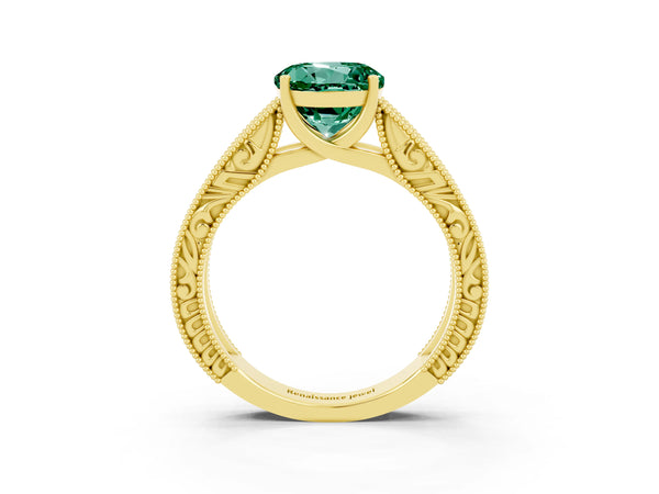 Yellow gold Round Cut Green Sapphire Solitaire Ring with Engraved Band and Four-Prong Setting
