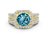 Yellow gold Round Cut Halo Blue Topaz Ring with Split Shank and Four-Prong Setting