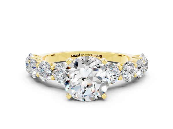 Yellow gold Round Cut Moissanite Prong Setting with Side Stones on a Pave Band