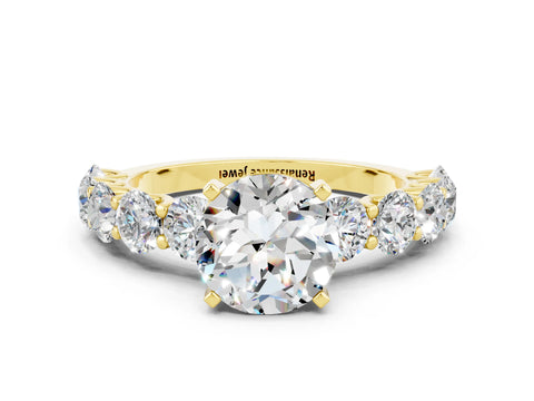 Yellow gold Round Cut Moissanite Prong Setting with Side Stones on a Pave Band