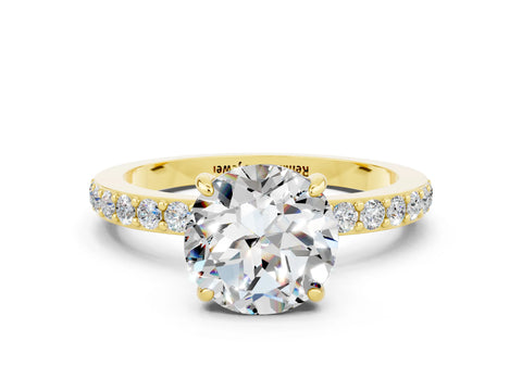 Yellow gold Round Cut Moissanite Ring with Pavé Band and Four-Prong Setting