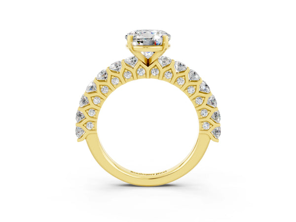 Yellow gold Round Cut Moissanite Solitaire Ring with Shared Prong Pavé Band and Four-Prong Setting