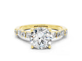 Yellow gold Round Cut Moissanite Solitaire with Side Baguettes and Channel Set Band