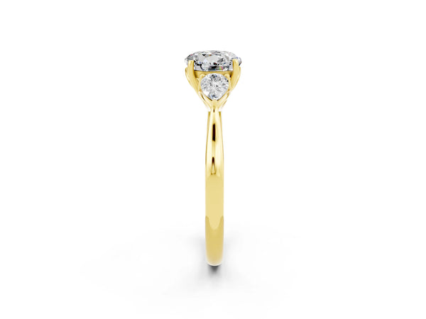 Yellow gold Round Cut Moissanite Three-Stone Ring with Pear  Side Stones and Prong Setting
