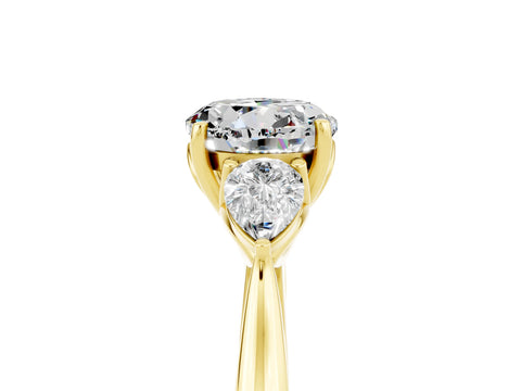 Yellow gold Round Cut Moissanite Three-Stone Ring with Pear Side Stones and Four-Prong Setting_17