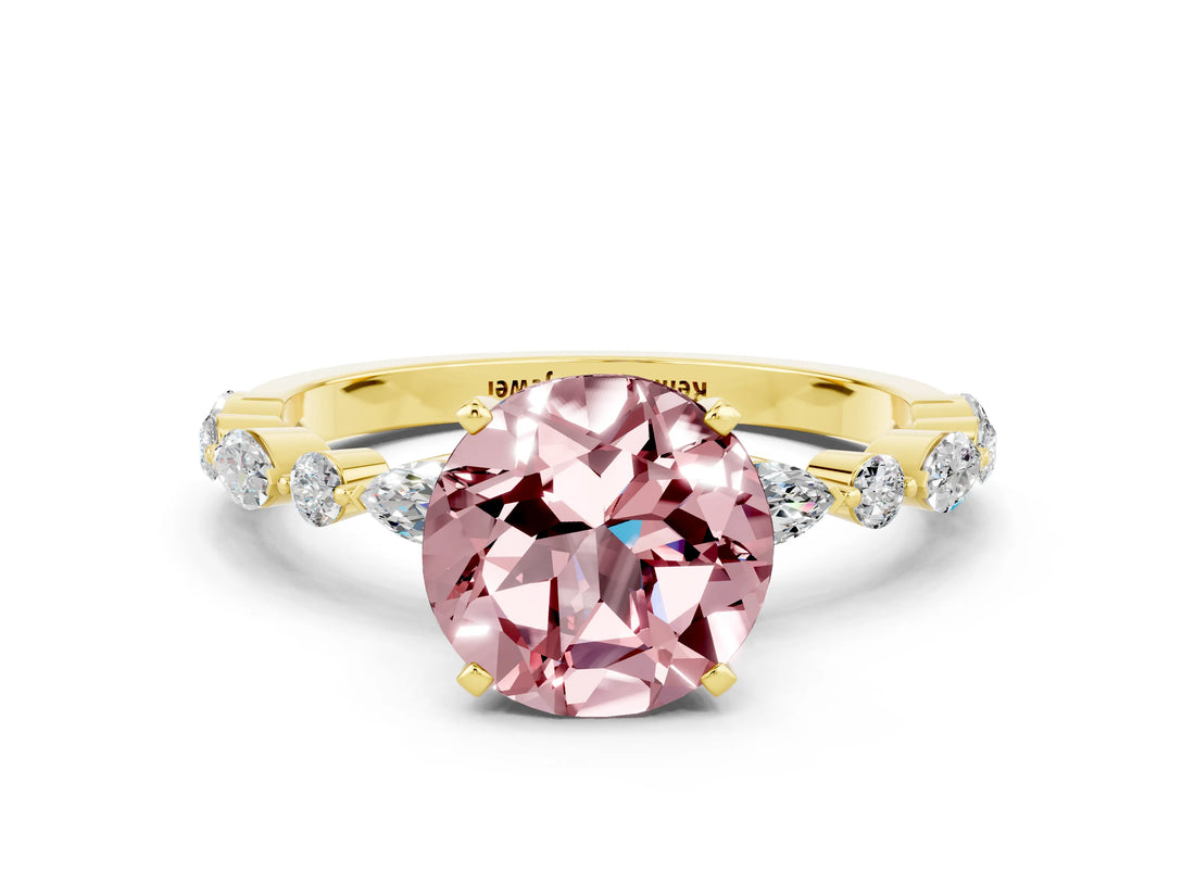 Yellow gold Round Cut Morganite Solitaire with Side Stones on a Pavé Band and Four-Prong Setting
