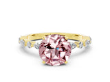 Yellow gold Round Cut Morganite Solitaire with Side Stones on a Pavé Band and Four-Prong Setting