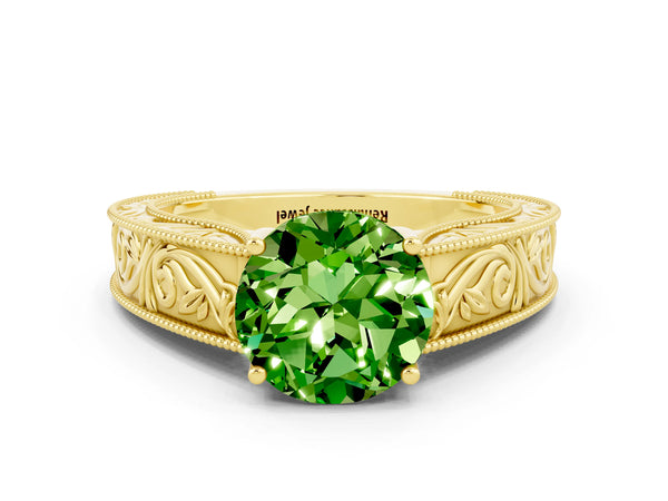 Yellow gold Round Cut Peridot Solitaire Ring with Engraved Band and Four-Prong Setting