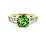 Yellow gold Round Cut Peridot Solitaire with Side Baguettes and Channel Set Band
