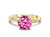 Yellow gold Round Cut Pink Sapphire Engagement Ring with Side Stone Accents and Four-Prong Setting_60