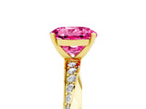 Yellow gold Round Cut Pink Sapphire Engagement Ring with Side Stone Accents and Four-Prong Setting_65