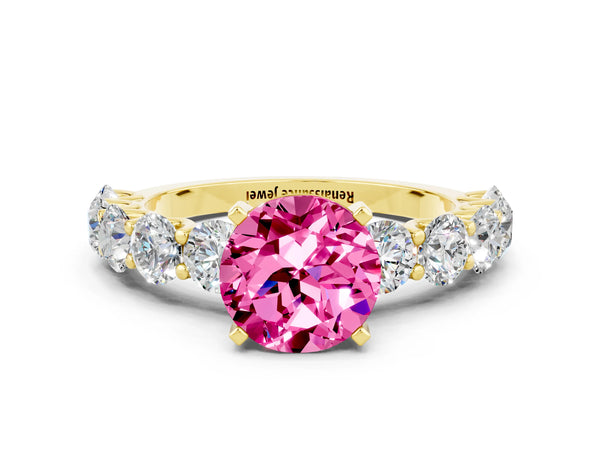 Yellow gold Round Cut Pink Sapphire Prong Setting with Side Stones on a Pave Band