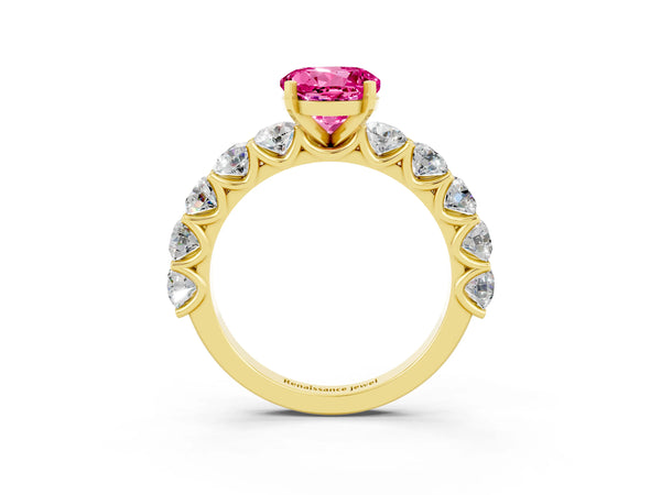 Yellow gold Round Cut Pink Sapphire Prong Setting with Side Stones on a Pave Band