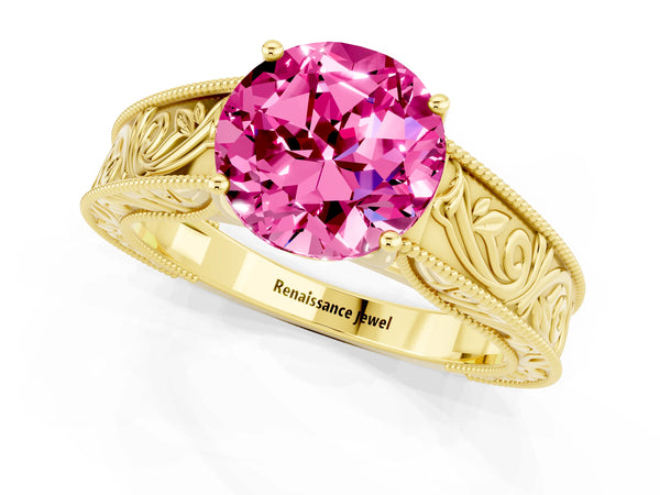 Yellow gold Round Cut Pink Sapphire Solitaire Ring with Engraved Band and Four-Prong Setting