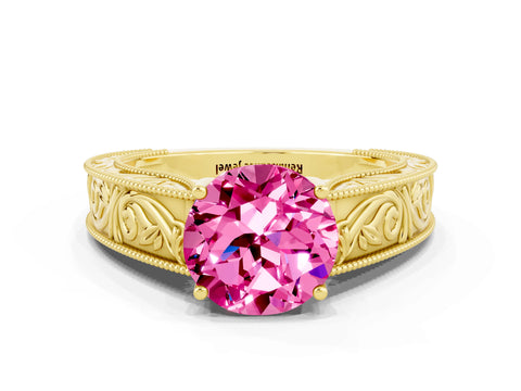 Yellow gold Round Cut Pink Sapphire Solitaire Ring with Engraved Band and Four-Prong Setting