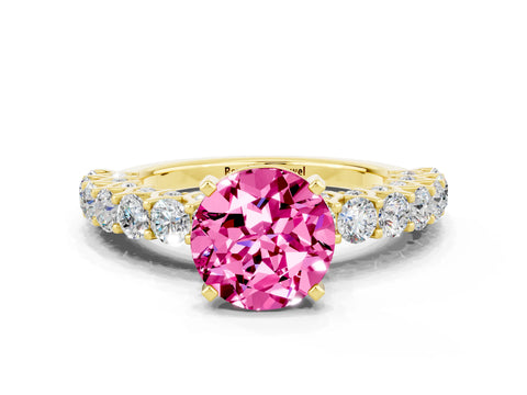 Yellow gold Round Cut Pink Sapphire Solitaire Ring with Shared Prong Pavé Band and Four-Prong Setting