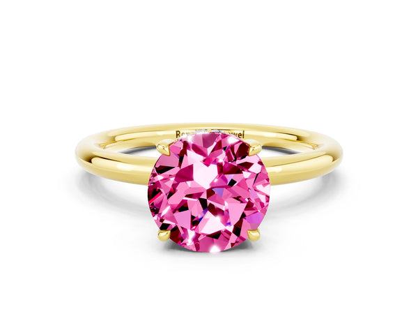 Yellow gold Round Cut Pink Sapphire Solitaire Ring with Thin Band and Four-Prong Setting