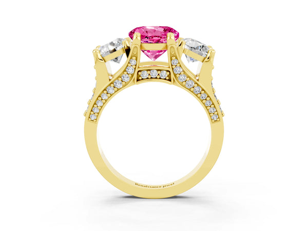 Yellow gold Round Cut Pink Sapphire Three-Stone Ring with Channel Set Band and Four-Prong Setting