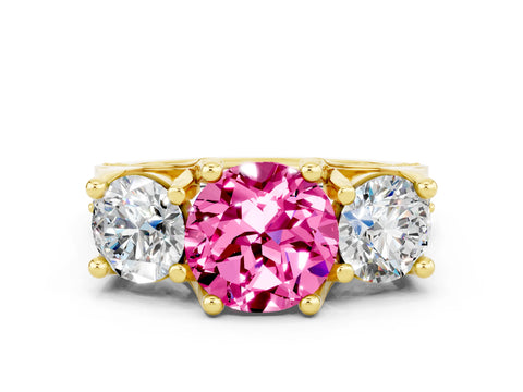 Yellow gold Round Cut Pink Sapphire Three-Stone Ring with Channel Set Band and Four-Prong Setting