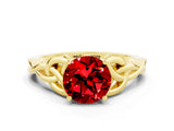 Yellow gold Round Cut Ruby Solitaire Engagement Ring with Celtic Knot Band and Four-Prong Setting