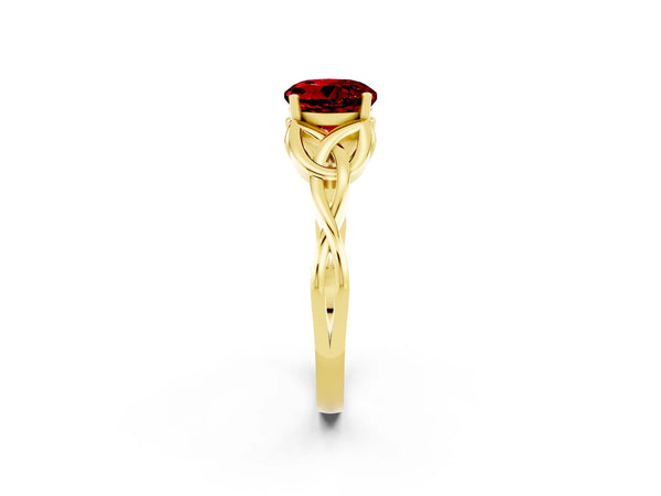 Yellow gold Round Cut Ruby Solitaire Engagement Ring with Celtic Knot Band and Four-Prong Setting