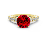 Yellow gold Round Cut Ruby Solitaire Ring with Cathedral Setting and Pavé Band
