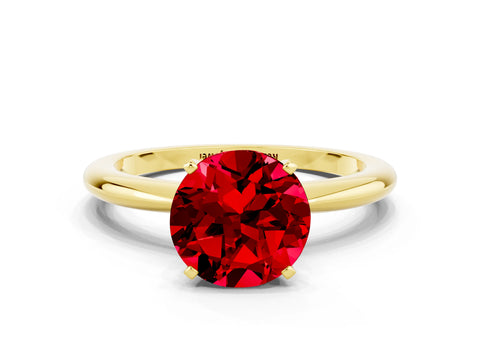 Yellow gold Round Cut Ruby Solitaire Ring with Six-Prong Setting and Classic Band