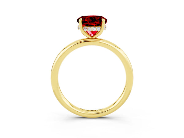 Yellow gold Round Cut Ruby Solitaire Ring with Thin Band and Four-Prong Setting
