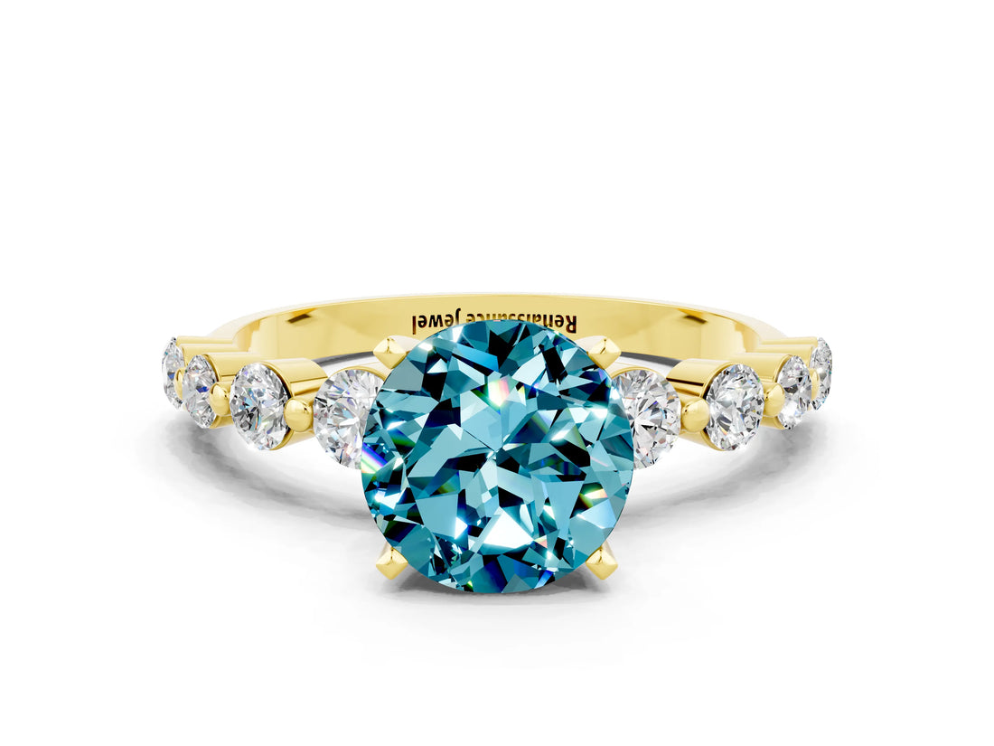 Yellow gold Round Cut Solitaire Blue Topaz Ring with Pave Band and Four-Prong Setting