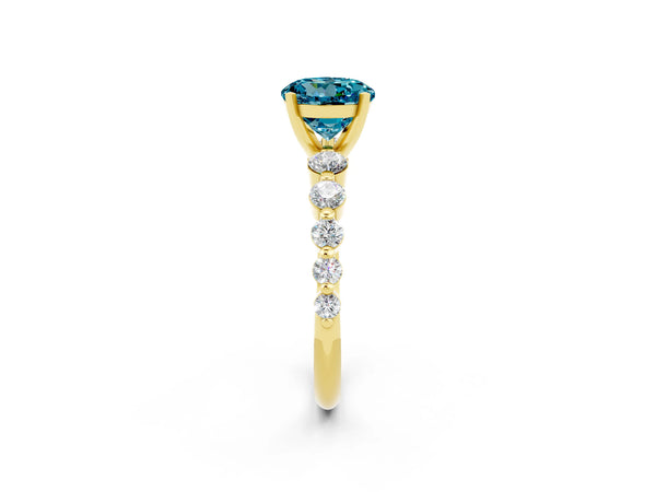 Yellow gold Round Cut Solitaire Blue Topaz Ring with Pave Band and Four-Prong Setting