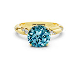 Yellow gold Round Cut Solitaire Diamond Engagement Ring with Twisted Pave Band and Four-Prong Setting
