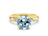 Yellow gold Round Cut Solitaire Diamond Engagement Ring with Twisted Pave Band and Four-Prong Setting