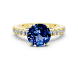 Yellow gold Round Cut Solitaire Diamond with Pavé Band and Four-Prong Setting