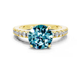 Yellow gold Round Cut Solitaire Diamond with Pavé Band and Four-Prong Setting